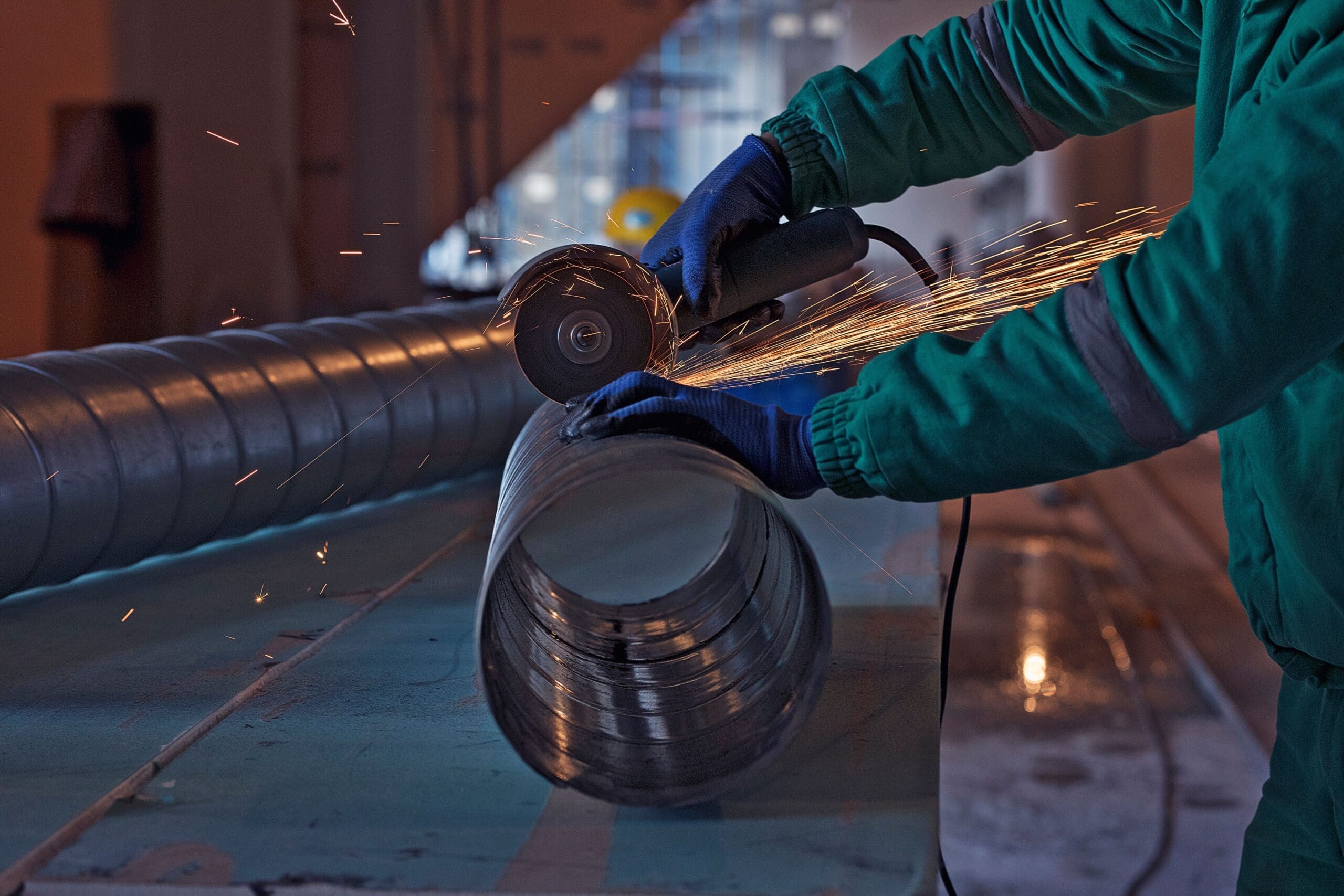 Arc welding process on structural steel during industrial metal fabrication and construction work